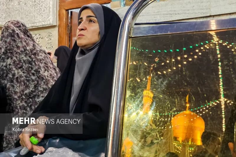 حرم مطهر امام رضا (ع) در شب بارانی عید قربان