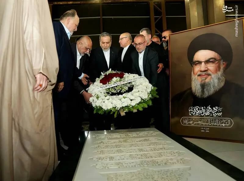 عکس/ ادای احترام عراقچی بر سر مزار شهید نصرالله